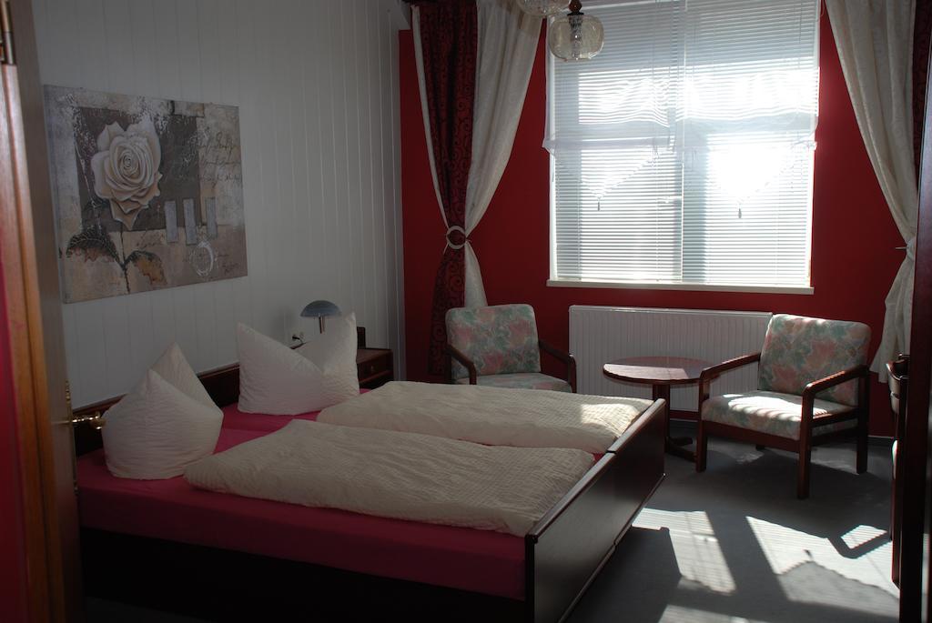Doppel- oder Zweibettzimmer